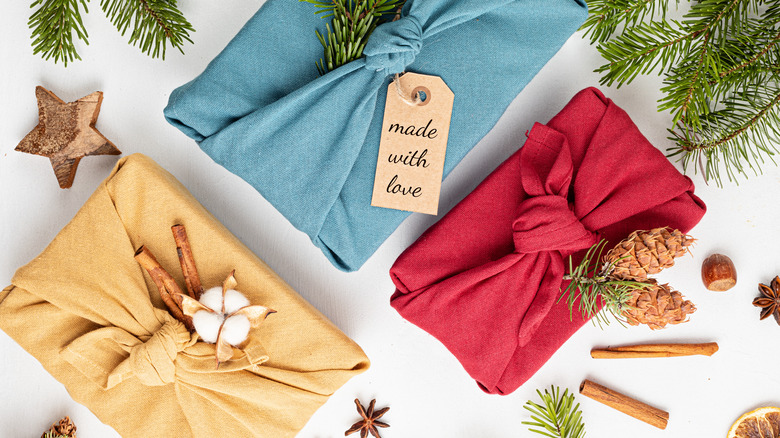 Eco friendly alternative green Xmas presents wrapped in clothes