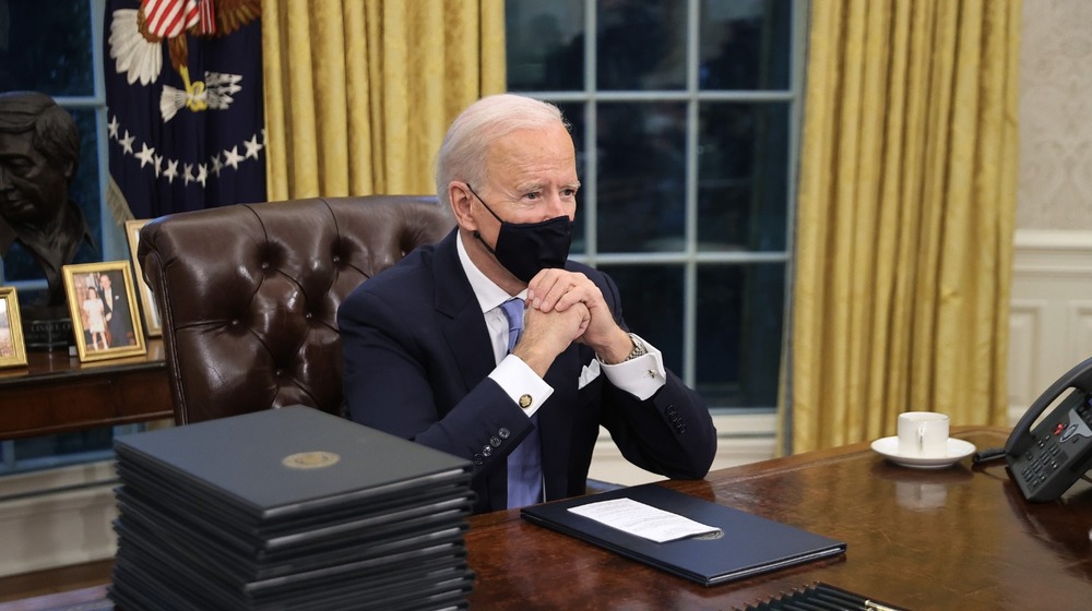 Joe Biden at the Resolute Desk in the Oval Office 