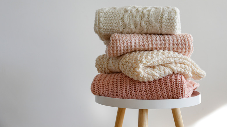 Pink and cream sweaters