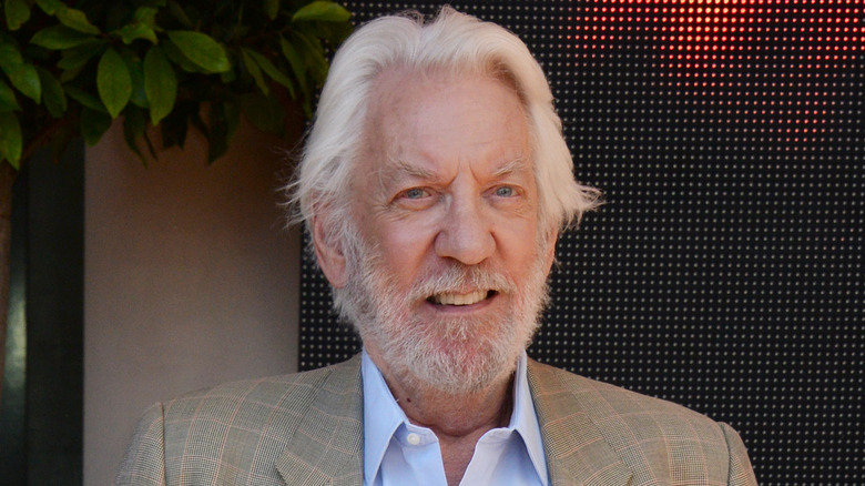 Donald Sutherland posing at Cannes 2014