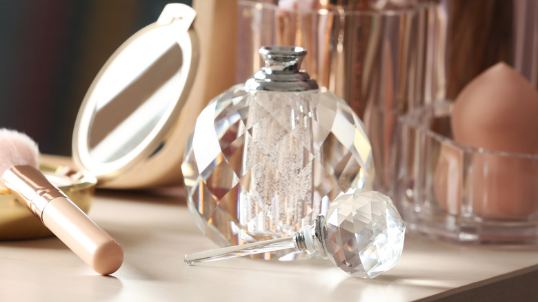 Crystal perfume bottle on vanity