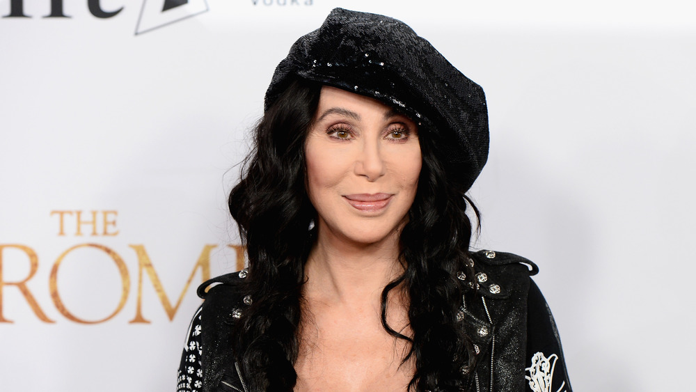 Cher in sequined hat
