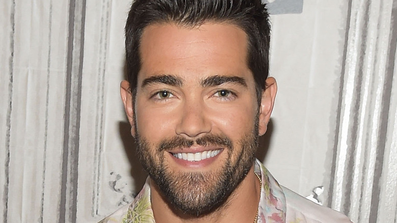 Jesse Metcalfe smiles at an event