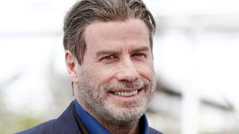 John Travolta smiling beard