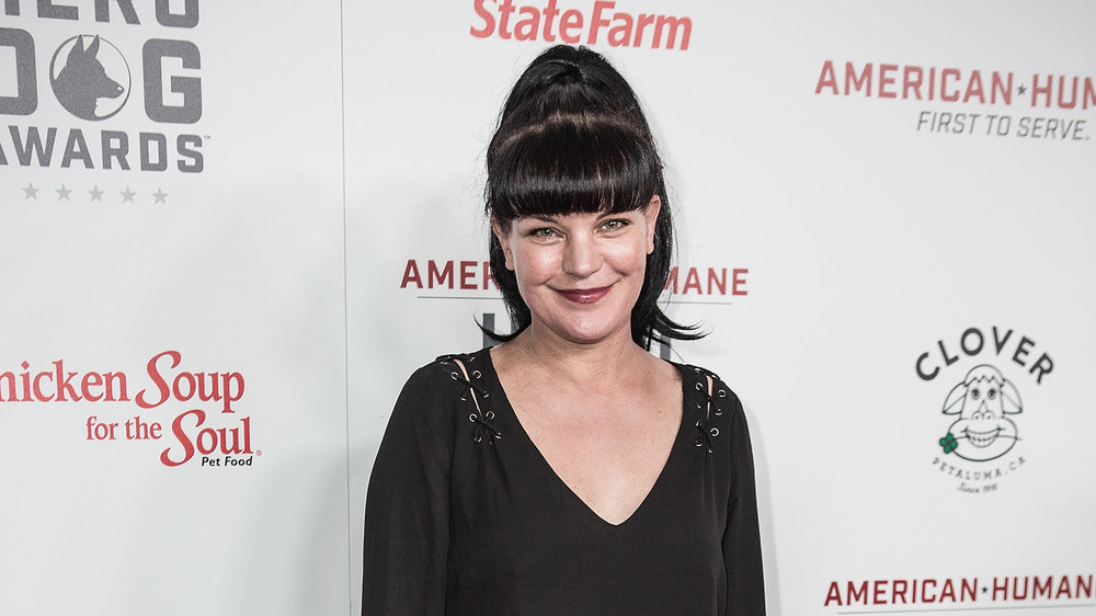 NCIS star Pauley Perrette smiling at an event