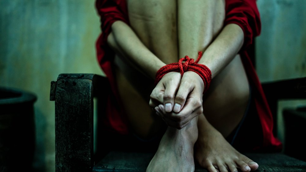 Woman hands tied
