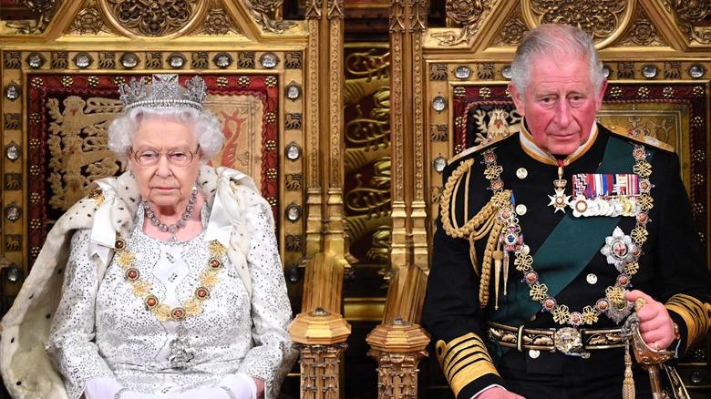 Queen Elizabeth II Prince Charles frowning