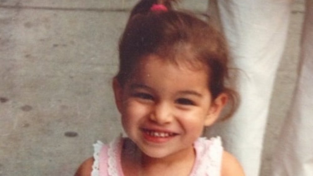 Bachelor star Ashley Iaconetti as a little girl with a ponytail
