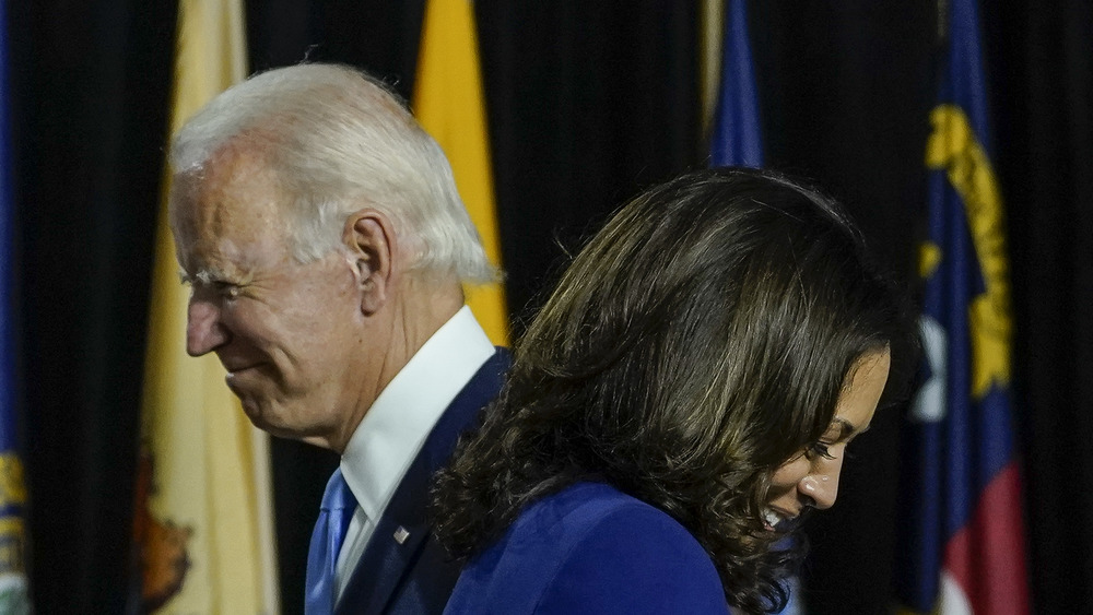 Kamala Harris laughing with Joe Biden