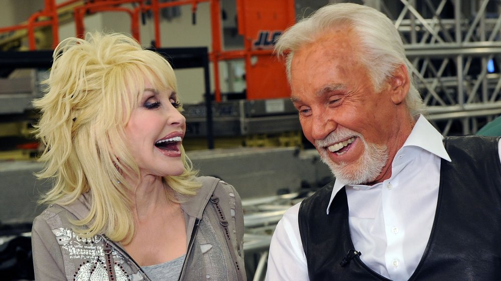 Dolly Parton and Kenny Rogers laughing