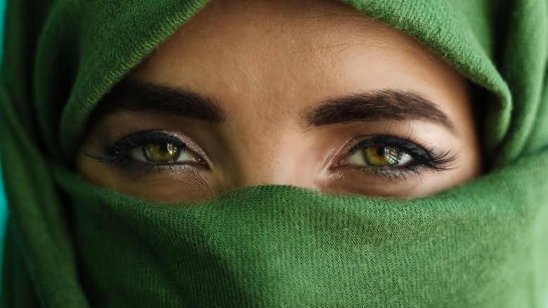 close up of woman with green eyes