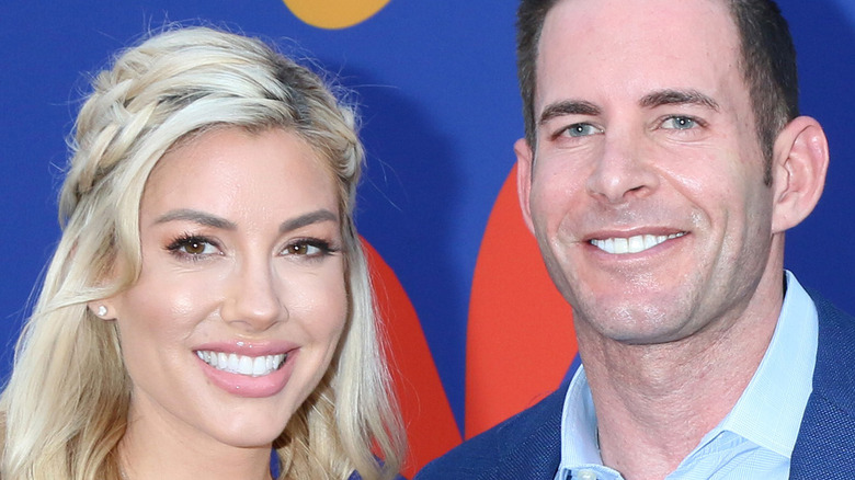 Heather Rae Young and Tarek El Moussa smiling