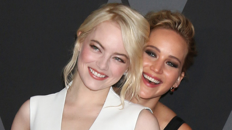 Jennifer Lawrence and Emma Stone at event