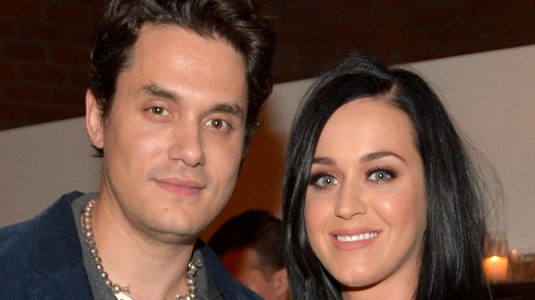 John Mayer and Katy Perry smiling, posing