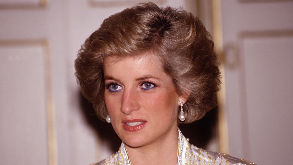 Princess Diana wearing blue eyeliner, close-up