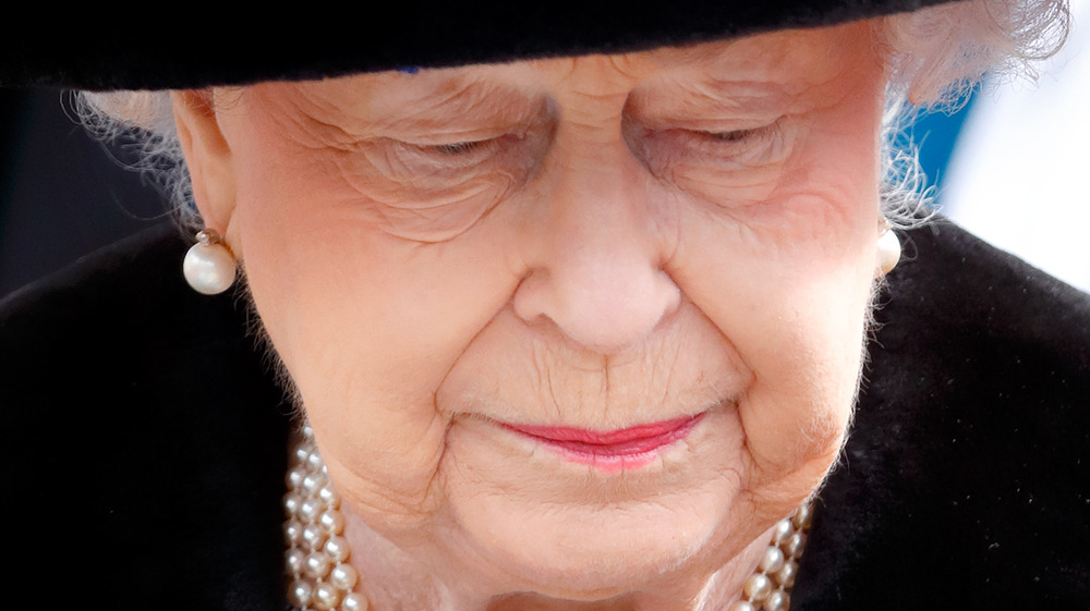 Queen Elizabeth looking somber 