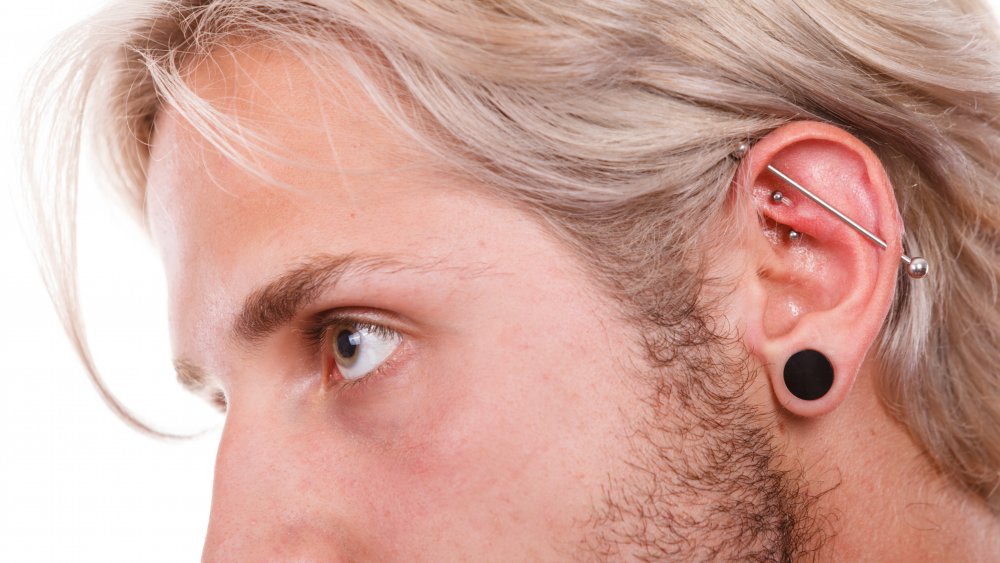 Man with rook piercing