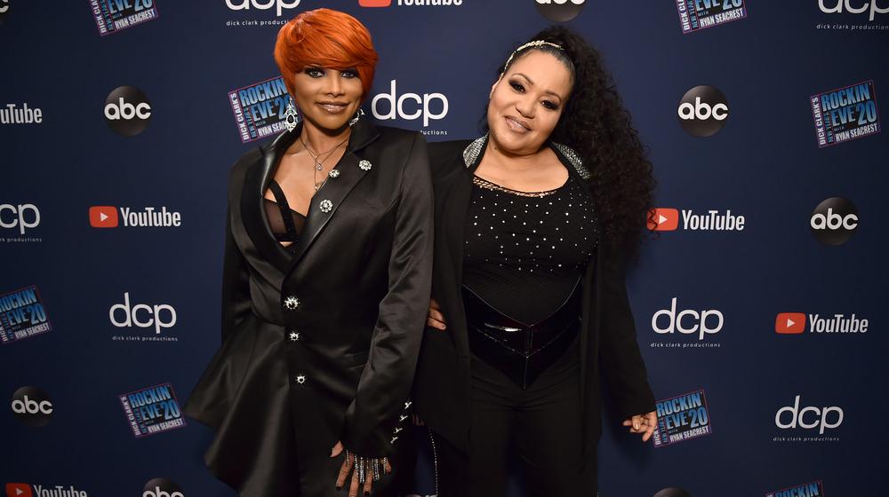 Sandra "Pepa" Denton and Cheryl "Salt" James smiling on the red carpet for Dick Clark's New Year's Rockin' Eve with Ryan Seacrest in 2020