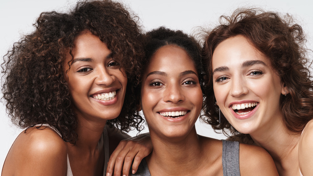 Three women with different complexions