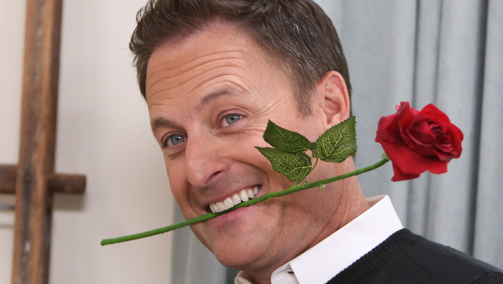 Chris Harrison with a rose