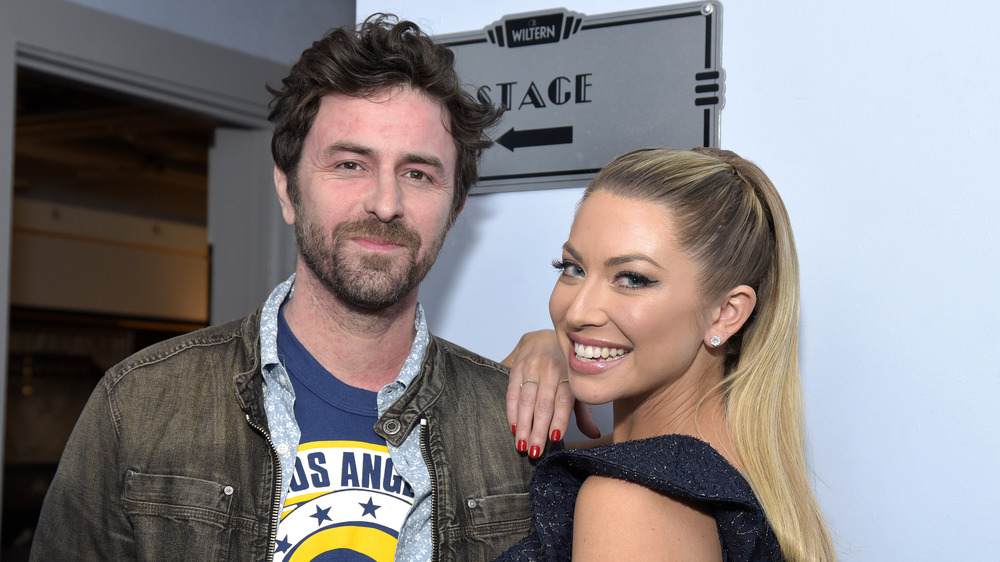 Beau Clark and Stassi Schroeder at a live Straight Up with Stassi show