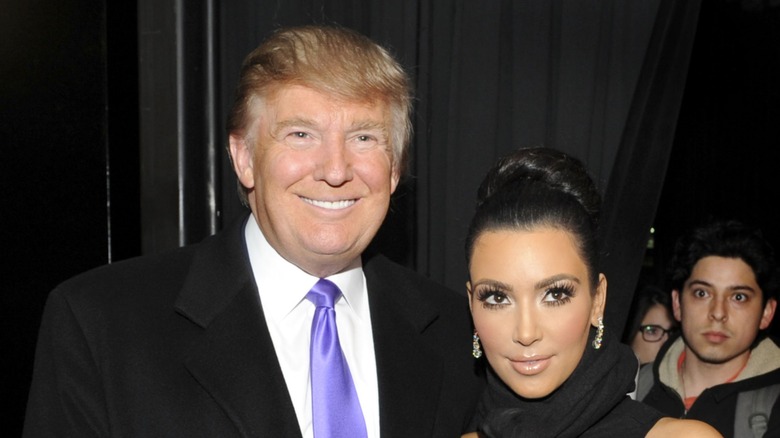 Donald Trump and Kim Kardashian smiling