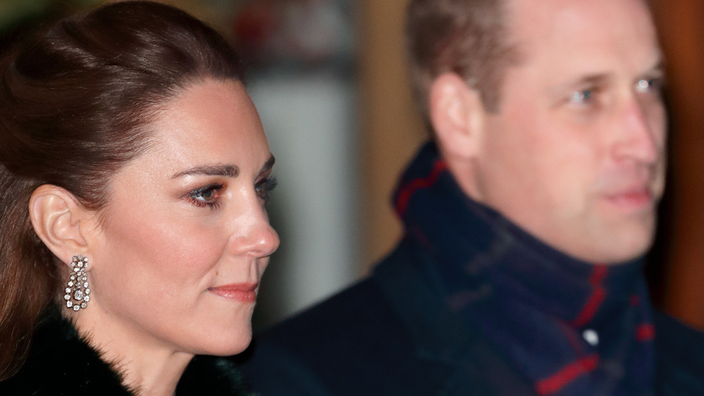 Kate Middleton foreground Prince William