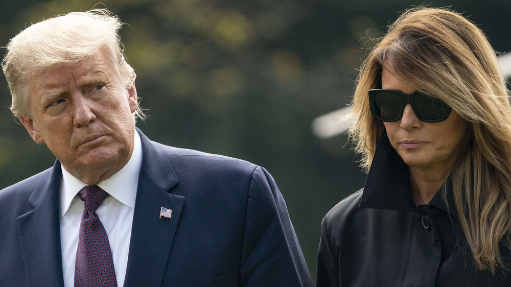 Donald and Melania Trump walk together