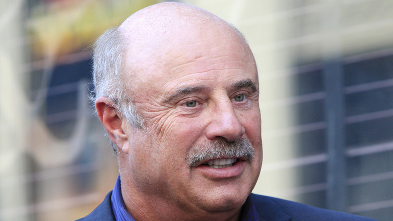 Dr. Phil attending an event
