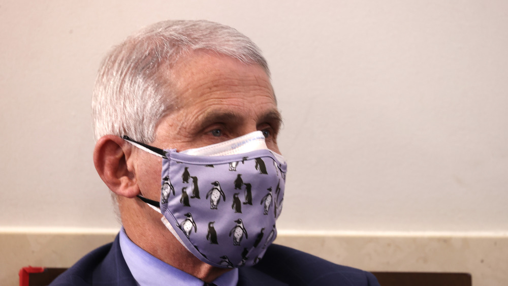 Dr Fauci with a penguin mask