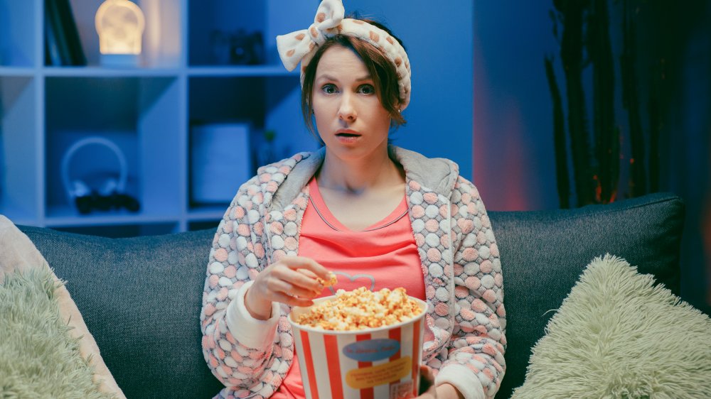 Woman binge-watching Netflix 