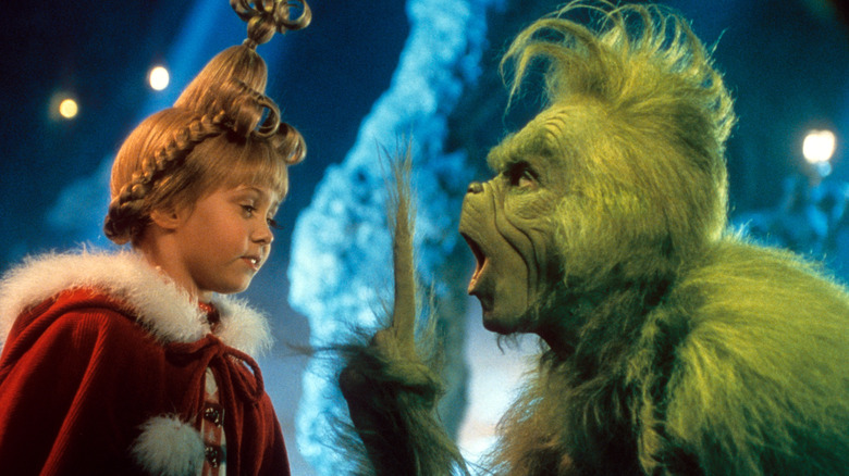 Taylor Momsen and Jim Carrey performing in How the Grinch Stole Christmas