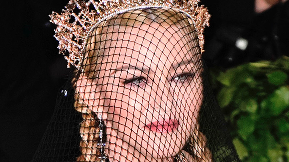 Madonna wearing netted veil