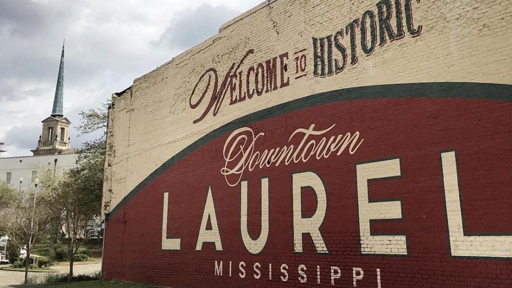 painted welcome to laurel sign