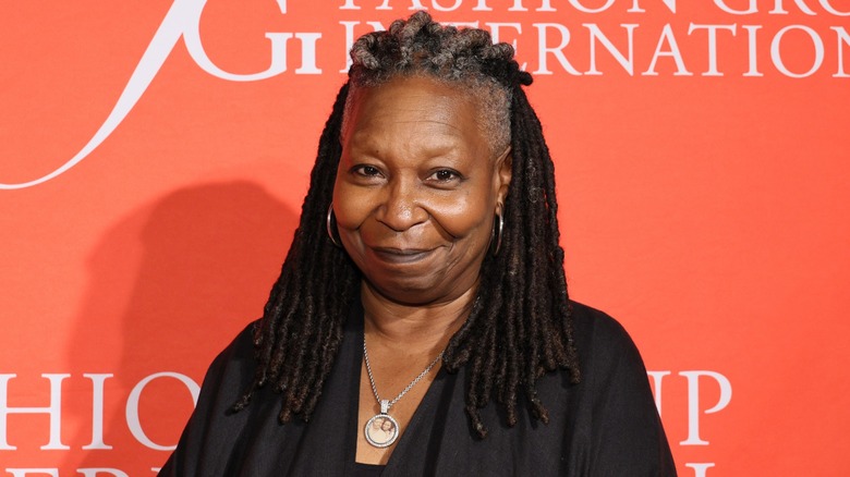 The View host Whoopi Goldberg smiling