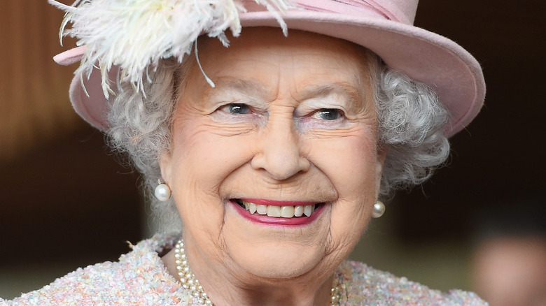 Queen Elizabeth smiles at an event