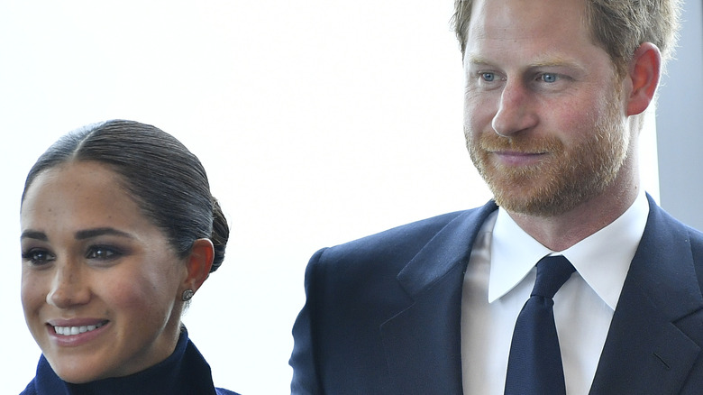 Meghan Markle and Prince Harry pose for a picture