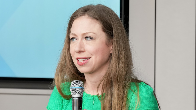 Chelsea Clinton holding microphone