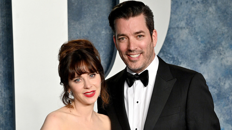 Zoey Deschanel and Jonathan Scott on the red carpet